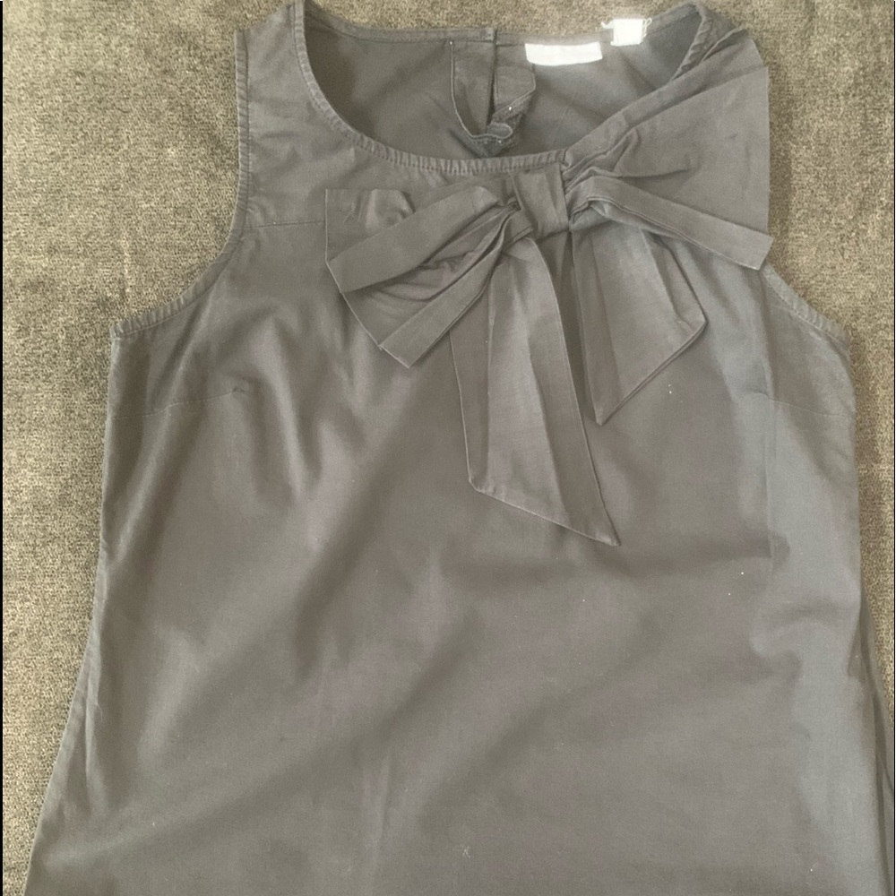 Beautiful, big black bow blouse. Casual shirt, dress up or dress down.